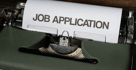 Typewriter representing common job application mistakes for tech candidates