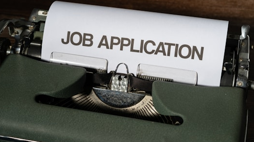 Typewriter representing common job application mistakes for tech candidates